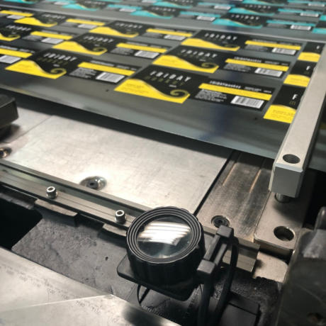Friday Monkey wine labels being printed on digital print machine